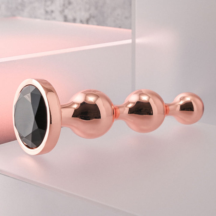 Gender X Gold Digger - Large Rose Gold Butt Plug with Black Gem Base