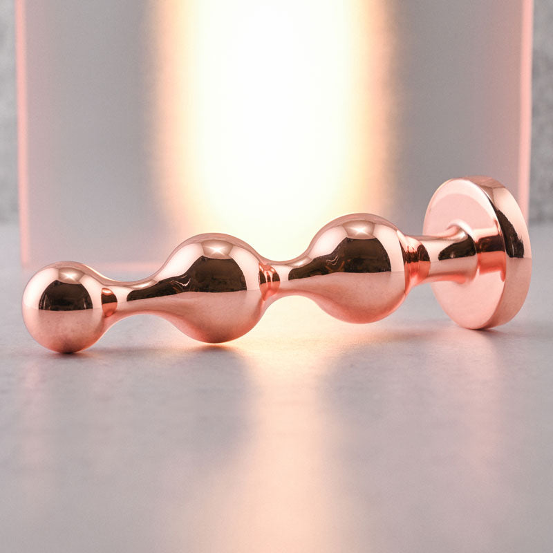 Gender X Gold Digger - Large Rose Gold Butt Plug with Black Gem Base