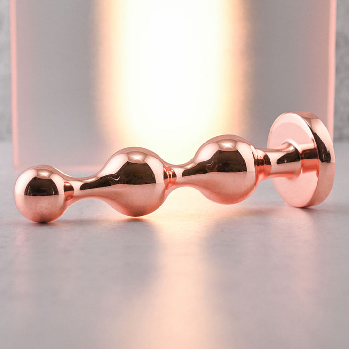 Gender X Gold Digger - Large Rose Gold Butt Plug with Black Gem Base