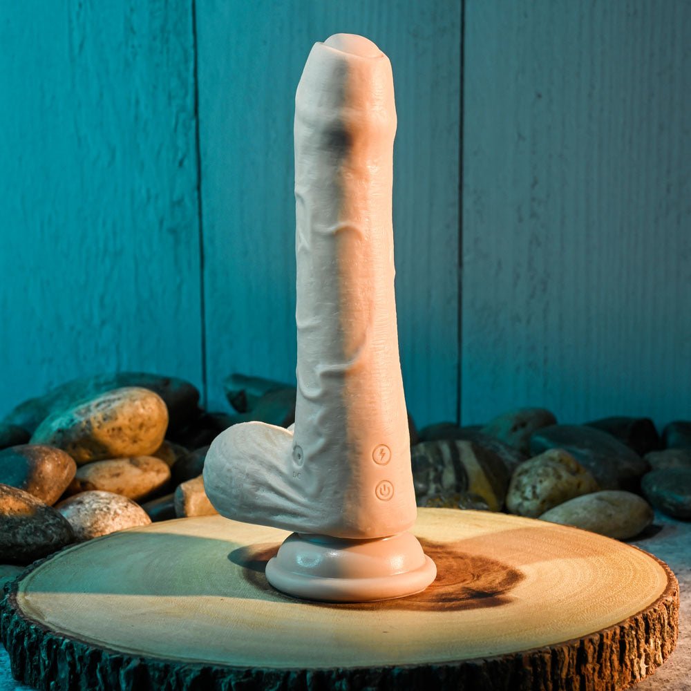 Evolved Peek A Boo 8.5 Inch Vibrating Uncut Dildo - Light Flesh