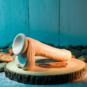 Evolved Peek A Boo 8.5 Inch Vibrating Uncut Dildo - Light Flesh