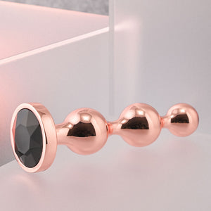 Gender X Gold Digger - Small Rose Gold Butt Plug with Black Gem Base