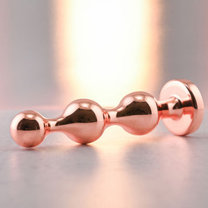 Gender X Gold Digger - Medium Rose Gold Butt Plug with Black Gem Base