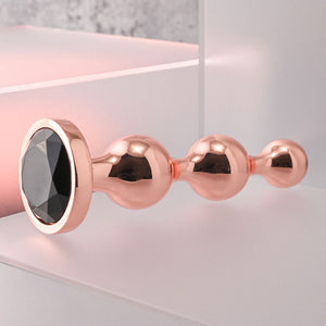 Gender X Gold Digger - Large Rose Gold Butt Plug with Black Gem Base